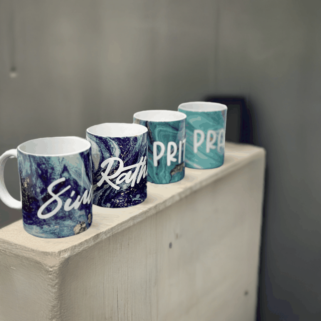 Family pack of custom text mugs by Makers Morph showcasing personalized designs for special occasions.